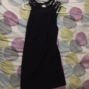 LBD bodycon style with strappy back design